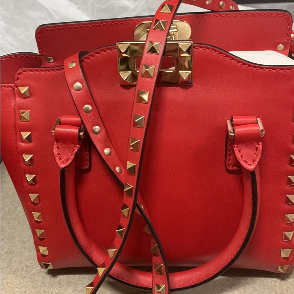 Beautiful Red with studs never used